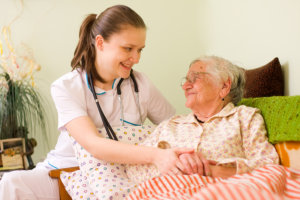 elderly woman and a young nurse